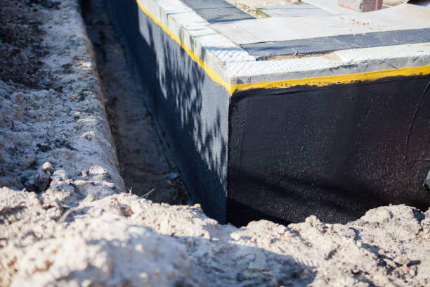 Professional Waterproofing technician working in Springfield, KY
